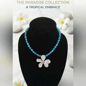 Elegant Blue Beaded Necklace with cyclamen White Flower Pendant